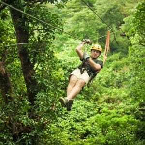 Sarapiqui River Sightseeing Cruise and Zipline Canopy Tour from San Jose