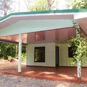 Starter home surrounded by 4 acres of jungle and bordered by river.